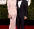 John Legend mino, y su mujer con un vestido con un gran trabajo.
