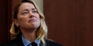 Actor Amber Heard testifies at Fairfax County Circuit Court during a defamation case against her by ex-husband, actor Johnny Depp in Fairfax, Virginia, U.S., May 4, 2022. Heard said there was an incident where Depp performed a cavity search while accusing her of harboring his drugs. REUTERS/Elizabeth Frantz/Pool