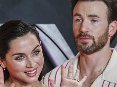 Ana de Armas, left, and Chris Evans pose for photographers upon arrival at the screening of the film 'The Gray Man' in London, Tuesday, July 19, 2022. (Photo by Scott Garfitt/Invision/AP)