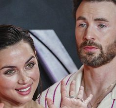 Ana de Armas, left, and Chris Evans pose for photographers upon arrival at the screening of the film 'The Gray Man' in London, Tuesday, July 19, 2022. (Photo by Scott Garfitt/Invision/AP)
