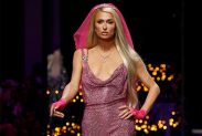 Paris Hilton presents a creation from the Versace Spring/Summer 2023 collection during Milan Fashion Week in Milan, Italy, September 23, 2022. REUTERS/Alessandro Garofalo