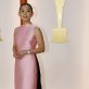 Hong Chau poses on the champagne-colored red carpet during the Oscars arrivals at the 95th Academy Awards in Hollywood, Los Angeles, California, U.S., March 12, 2023. REUTERS/Eric Gaillard