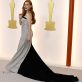Jessica Chastain poses on the champagne-colored red carpet during the Oscars arrivals at the 95th Academy Awards in Hollywood, Los Angeles, California, U.S., March 12, 2023. REUTERS/Eric Gaillard