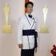 Harry Shum Jr. poses on the champagne-colored red carpet during the Oscars arrivals at the 95th Academy Awards in Hollywood, Los Angeles, California, U.S., March 12, 2023. REUTERS/Eric Gaillard