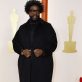 Questlove poses on the champagne-colored red carpet during the Oscars arrivals at the 95th Academy Awards in Hollywood, Los Angeles, California, U.S., March 12, 2023. REUTERS/Eric Gaillard