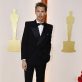 Austin Butler poses on the champagne-colored red carpet during the Oscars arrivals at the 95th Academy Awards in Hollywood, Los Angeles, California, U.S., March 12, 2023. REUTERS/Eric Gaillard