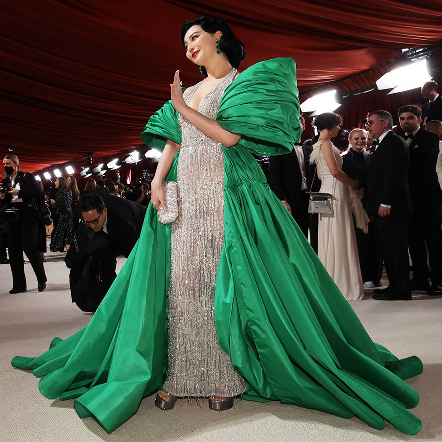 Fan Bingbing poses on the champagne-colored red carpet during the Oscars arrivals at the 95th Academy Awards in Hollywood, Los Angeles, California, U.S., March 12, 2023. REUTERS/Mario Anzuoni