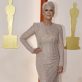 Jamie Lee Curtis poses on the champagne-colored red carpet during the Oscars arrivals at the 95th Academy Awards in Hollywood, Los Angeles, California, U.S., March 12, 2023. REUTERS/Eric Gaillard