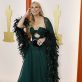 Molly Sims poses on the champagne-colored red carpet during the Oscars arrivals at the 95th Academy Awards in Hollywood, Los Angeles, California, U.S., March 12, 2023. REUTERS/Eric Gaillard
