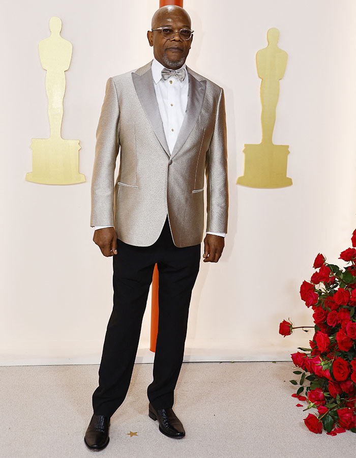 Samuel L. Jackson poses on the champagne-colored red carpet during the Oscars arrivals at the 95th Academy Awards in Hollywood, Los Angeles, California, U.S., March 12, 2023. REUTERS/Eric Gaillard