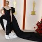 Elizabeth Banks poses on the champagne-colored red carpet during the Oscars arrivals at the 95th Academy Awards in Hollywood, Los Angeles, California, U.S., March 12, 2023. REUTERS/Eric Gaillard