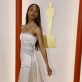 Zoe Saldana poses on the champagne-colored red carpet during the Oscars arrivals at the 95th Academy Awards in Hollywood, Los Angeles, California, U.S., March 12, 2023. REUTERS/Eric Gaillard