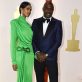 Idris Elba and his wife Sabrina Dhowre Elba pose on the champagne-colored red carpet during the Oscars arrivals at the 95th Academy Awards in Hollywood, Los Angeles, California, U.S., March 12, 2023. REUTERS/Eric Gaillard