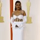 Mindy Kaling poses on the champagne-colored red carpet during the Oscars arrivals at the 95th Academy Awards in Hollywood, Los Angeles, California, U.S., March 12, 2023. REUTERS/Eric Gaillard
