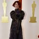 Jessie Buckley poses on the champagne-colored red carpet during the Oscars arrivals at the 95th Academy Awards in Hollywood, Los Angeles, California, U.S., March 12, 2023. REUTERS/Eric Gaillard